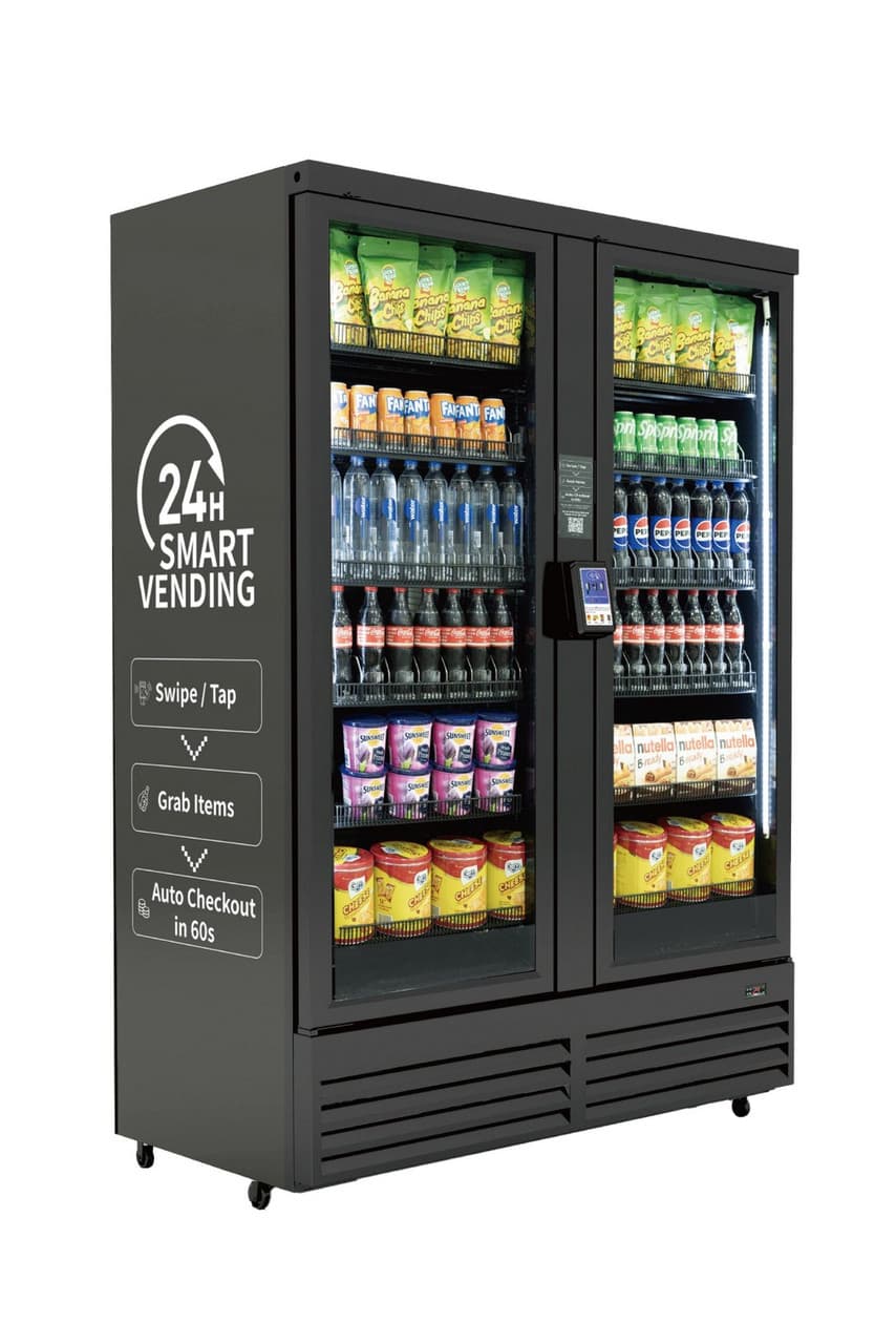 Black two-door smart vending machine stocked with snacks and drinks, featuring automated checkout instructions.